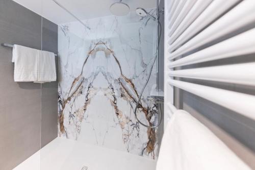 Un baño de Hotel Domizil