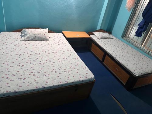 Postel nebo postele na pokoji v ubytování Shubh laxmi hotel Itahari