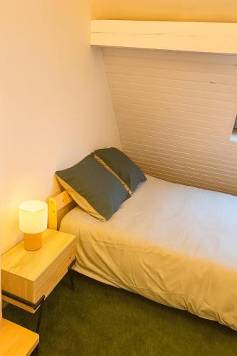 Ένα ή περισσότερα κρεβάτια σε δωμάτιο στο Escapade Secrète