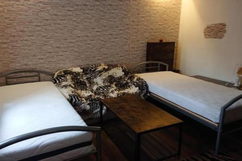 Postel nebo postele na pokoji v ubytování FeWo Orchideenzauber