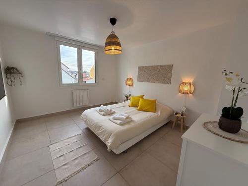 Giường trong phòng chung tại Superbe Luxury T3 proche Paris & Disneyland