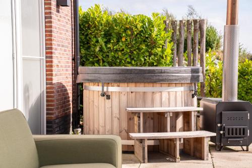 Imagen de la galería de Villa Crème de la Kremmer met Hottub & Sauna | 8 personen, en Gasselte