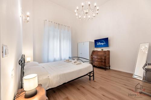 Ένα ή περισσότερα κρεβάτια σε δωμάτιο στο New Modern Apt- Center 10min - Hiper WiFi - A-C