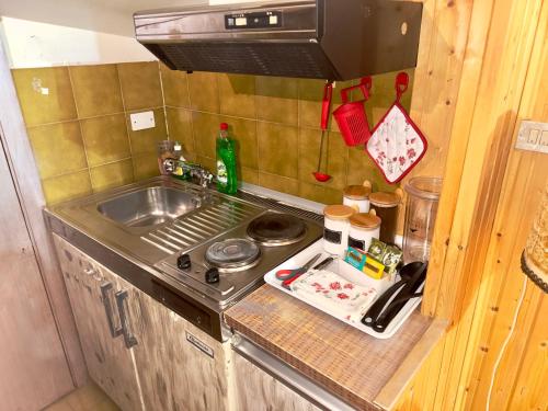 Kuchyň nebo kuchyňský kout v ubytování Casa Vacanze Montane