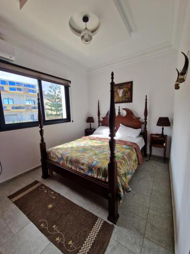 Ένα ή περισσότερα κρεβάτια σε δωμάτιο στο Afro house