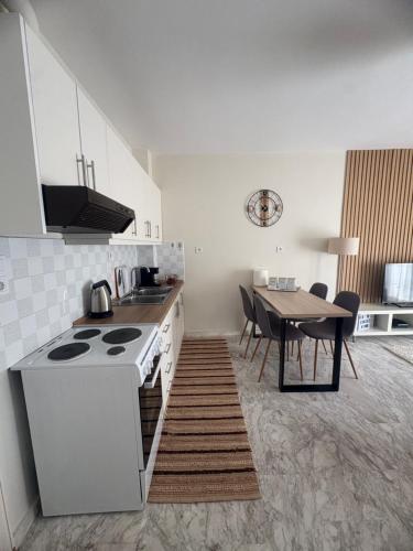 Kuchyň nebo kuchyňský kout v ubytování G&M Home