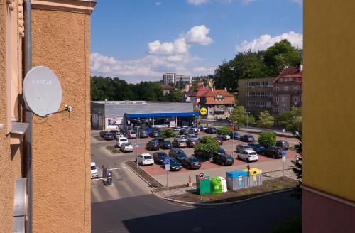 a view of a parking lot with cars parked at Apartment Karla Capka Street in Karlovy Vary