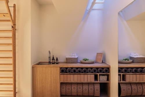 a kitchen with a sink and a wooden counter at The Square in Copenhagen