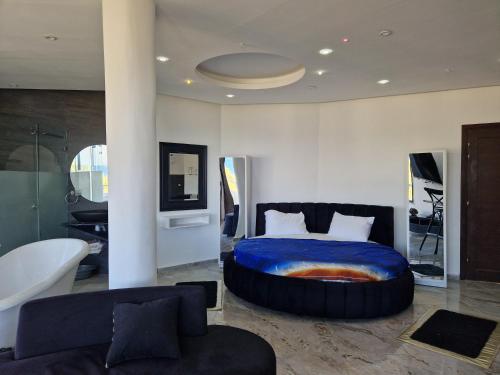 Ένα ή περισσότερα κρεβάτια σε δωμάτιο στο Houria palace