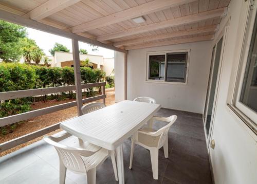 Balkón nebo terasa v ubytování Villaggio Camping Spiaggia Lunga