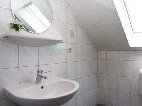 Ένα μπάνιο στο Ferienwohnung Niemeier