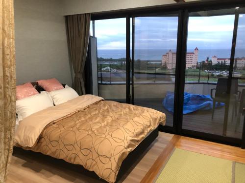 Postel nebo postele na pokoji v ubytování Villa resort 悠