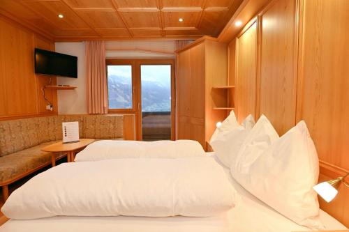 Ένα ή περισσότερα κρεβάτια σε δωμάτιο στο Rundblick 4 Panorama Groß