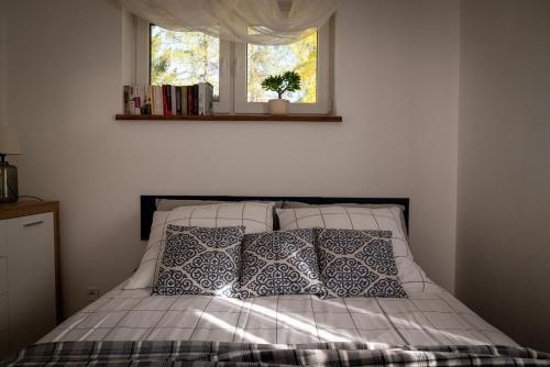 Postel nebo postele na pokoji v ubytování Domek na Szlaku