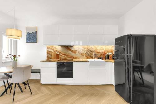 Foto Quiet Central Apartment on Dunajská - Up to 6 Guests 3