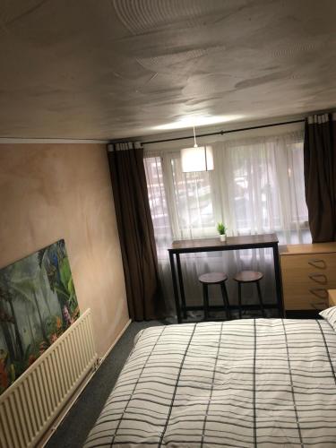 Ένα ή περισσότερα κρεβάτια σε δωμάτιο στο Hunters Apartment & rooms