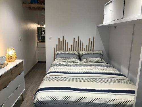 Postel nebo postele na pokoji v ubytování Petit nid douillet