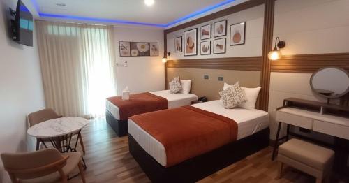 Una cama o camas en una habitación de Viphuanan Resort