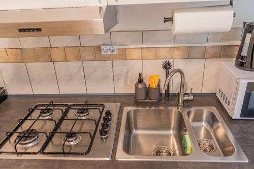 Kuchyň nebo kuchyňský kout v ubytování Modernes Apartment Offenbach, nähe Frankfurt Messe