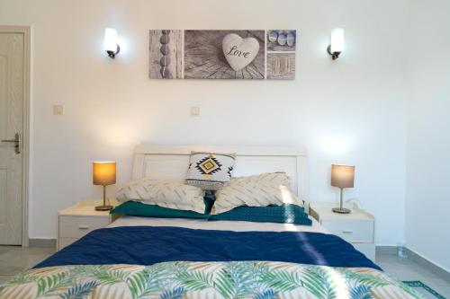 Ένα ή περισσότερα κρεβάτια σε δωμάτιο στο D10 Beach Front One Bedroom Apartment