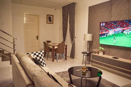 TV a/nebo společenská místnost v ubytování Oiza haven homes