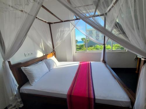 Ένα ή περισσότερα κρεβάτια σε δωμάτιο στο Villa Sea View