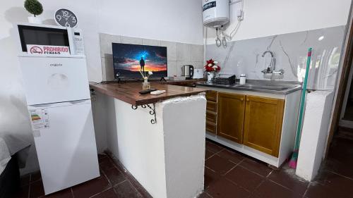 Cuisine ou kitchenette dans l'établissement Colonia Home
