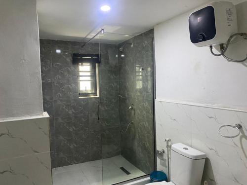 Ένα μπάνιο στο House 32 Hotels and Suites