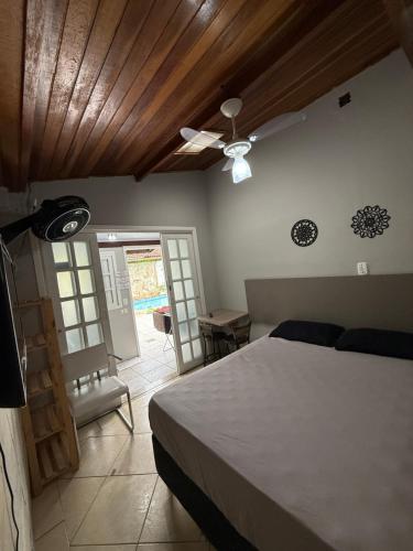 Postel nebo postele na pokoji v ubytování Bertioga litoral