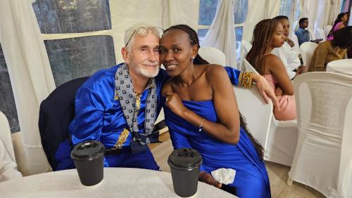 a man and a woman sitting at a table at Ahvenbloem Park in Kelso