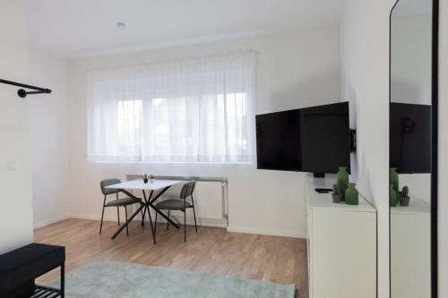 TV a/nebo společenská místnost v ubytování Premium Black Forest Suite - Apartment