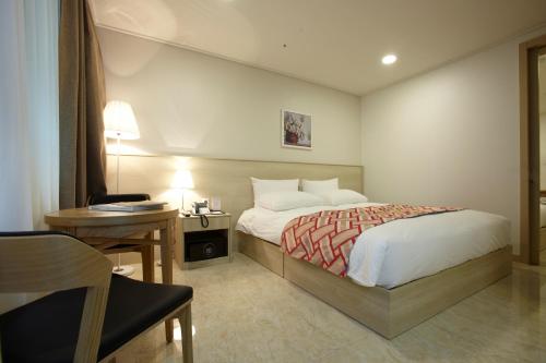 Ένα ή περισσότερα κρεβάτια σε δωμάτιο στο Hotel Sopra Incheon Cheongna