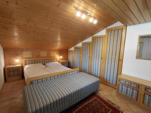 Postel nebo postele na pokoji v ubytování Hillside Apartments Bad Kleinkirchheim