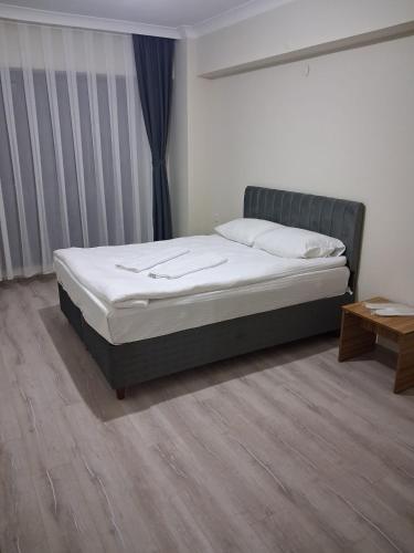 Ένα ή περισσότερα κρεβάτια σε δωμάτιο στο Bolu Tabaklar suit