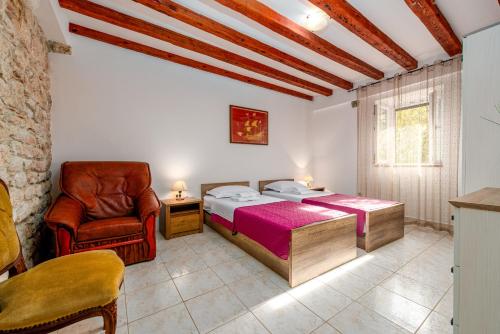 Postel nebo postele na pokoji v ubytování Villa Stocco