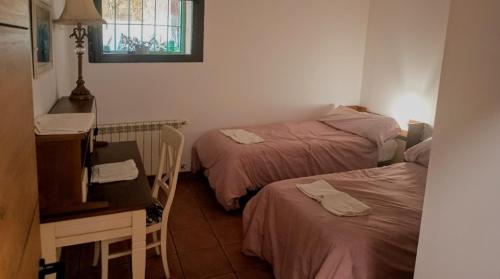 Ένα ή περισσότερα κρεβάτια σε δωμάτιο στο Molino de Tábara
