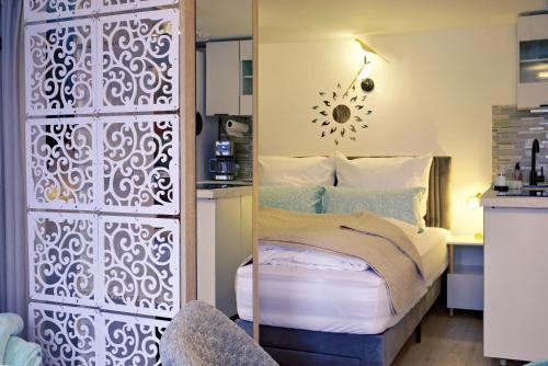 a bedroom with a bed with a gate in it at Ferienwohnung Sonnengarten in Meschede