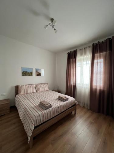 Postel nebo postele na pokoji v ubytování Easy Bergamo Apartment