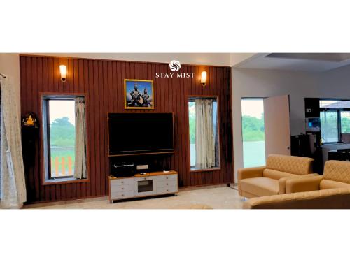 TV a/nebo společenská místnost v ubytování Millennium Villa - StayMist
