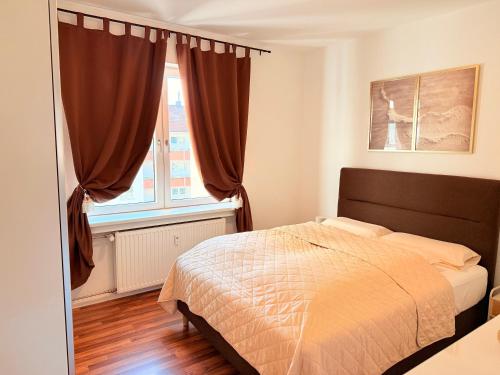 Postel nebo postele na pokoji v ubytování Wohnungen am Hagener Hbf