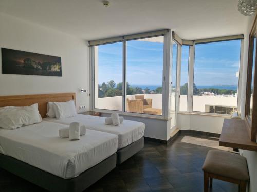 Postel nebo postele na pokoji v ubytování Prainha Clube