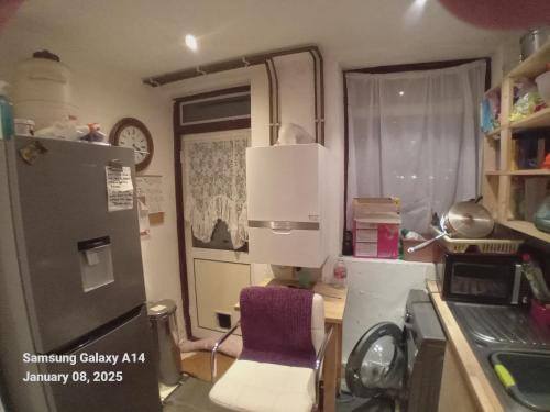 Η κουζίνα ή μικρή κουζίνα στο Guest house in rear garden