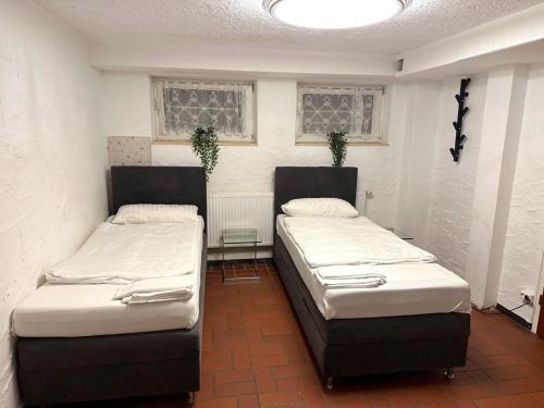 Postel nebo postele na pokoji v ubytování Monteurwohnung in Hürth bei Köln