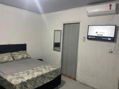 Μια τηλεόραση ή/και κέντρο ψυχαγωγίας στο Kitnets da Lu