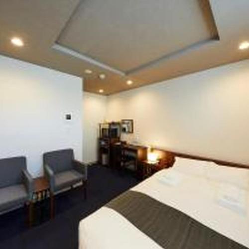 Un pat sau paturi într-o cameră la IYASHI KIYOMIZU GOJO -Double Room- Boutique Hotel 癒し 清水五条 ダブルルーム
