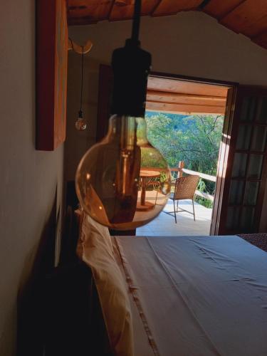 Giường trong phòng chung tại Repousada Sana