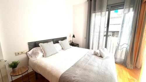 Postel nebo postele na pokoji v ubytování Acogedor apartamento by Prestigi