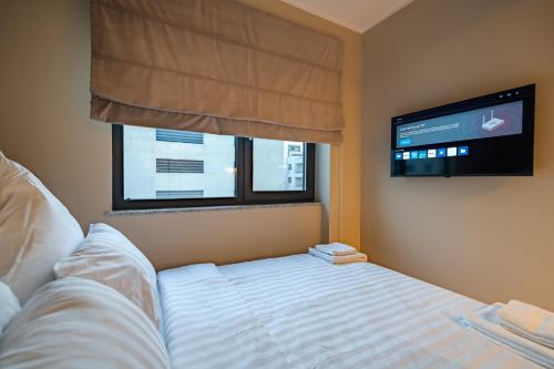 Postel nebo postele na pokoji v ubytování Own the Moment by Blvd 41B7 - Modern Cozy Apartment in Pipera