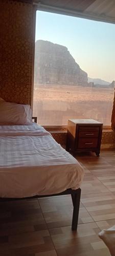 Ένα ή περισσότερα κρεβάτια σε δωμάτιο στο WADl Rum Ali