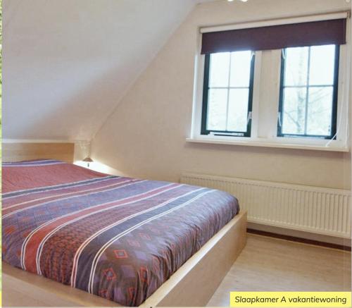 Postel nebo postele na pokoji v ubytování Wildeman